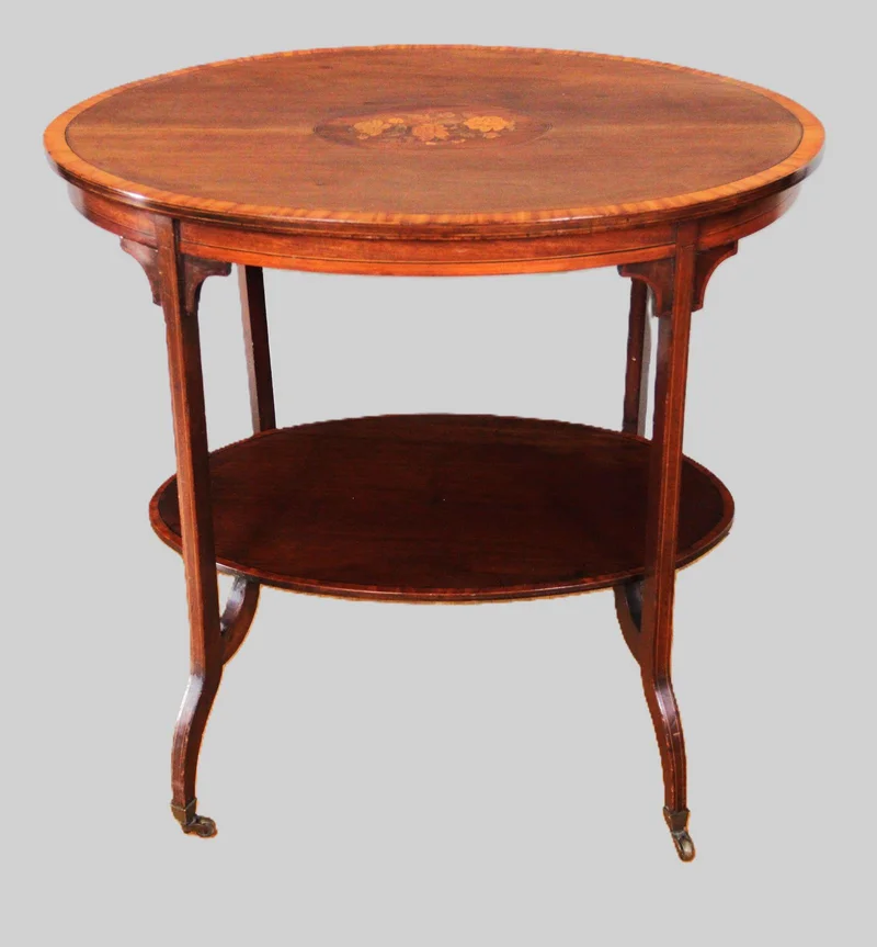 Edwardian bijzettafel - Meubel › Tafels - €395.00 - Edwardian salontafeltje in mahoniehout met inlegwerk in het bovenblad.
76 x 53cm, 70cm hoog
Periode 1920-1930