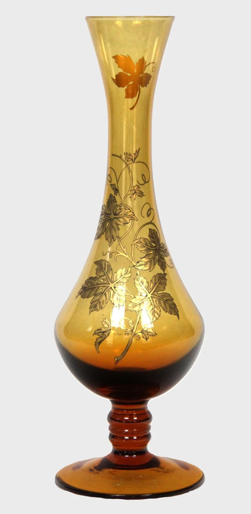 Geel glazen vaasje met goudversiering - Glas › Vazen - 26cm hoog, 9cm diameter
Doorgekleurd glas.
1950-1970